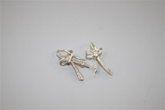 A pair of 20th century yellow metal and diamond set ribbon bow drop earrings, bow 22mm, gross weight 3.8 grams.